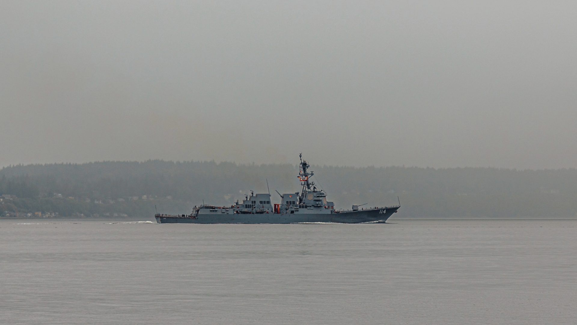 us navy battleship in fog