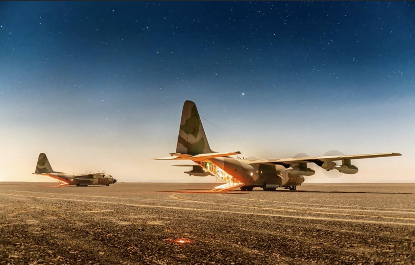 low light full color night vision image of military plane