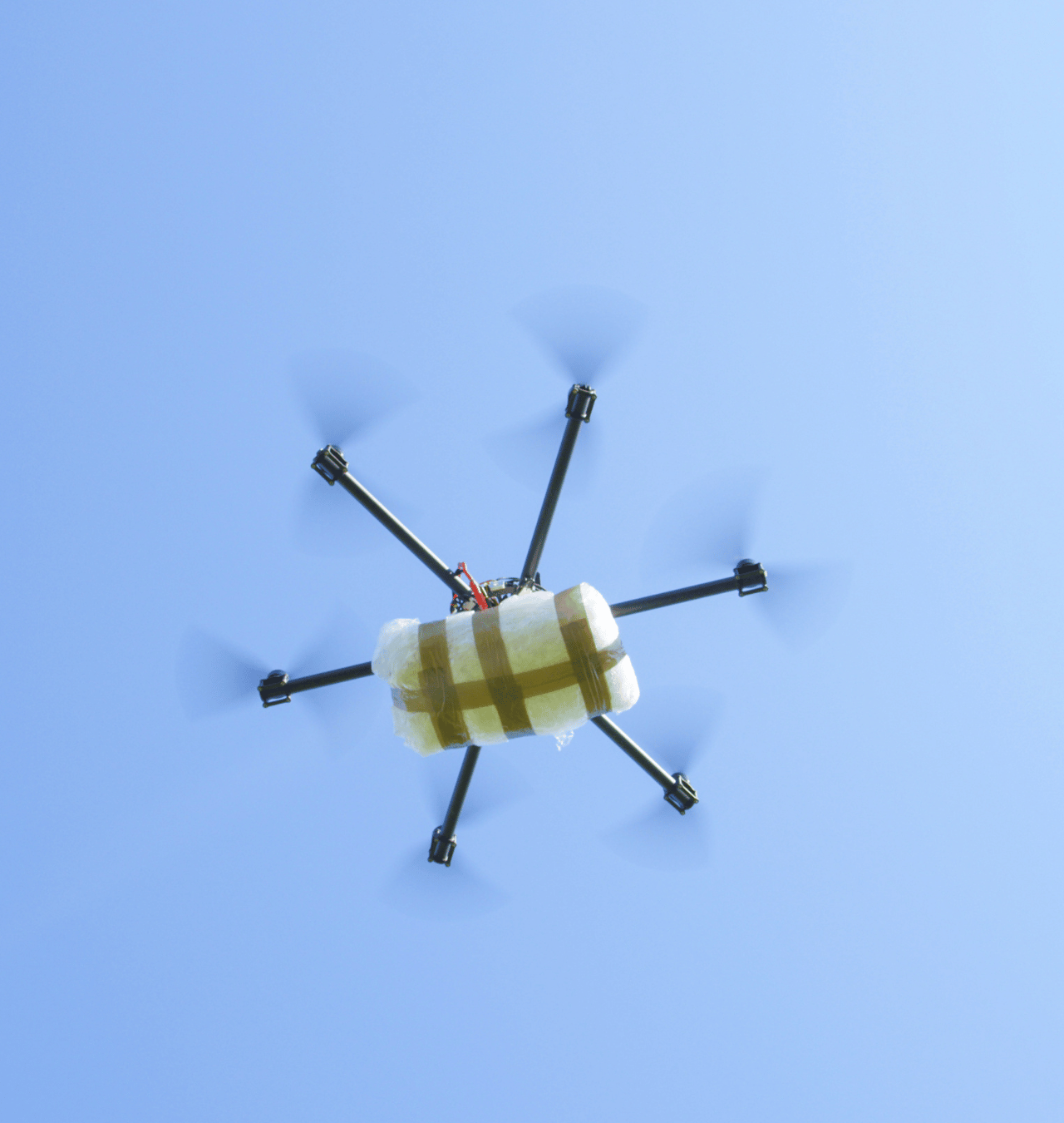 uav drone carrying smuggling bomb or drugs