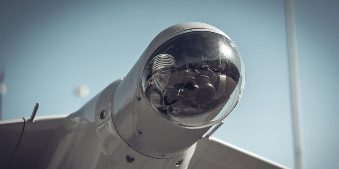 Forward Looking Infrared Camera in the head of an unmanned military drone close-up, modern military equipment